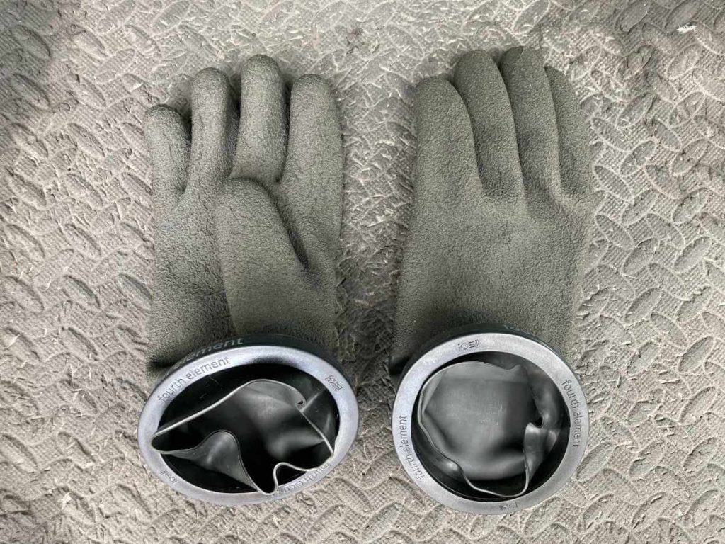 A Pair of Fourth Element Dry gloves with ring system used with drysuits