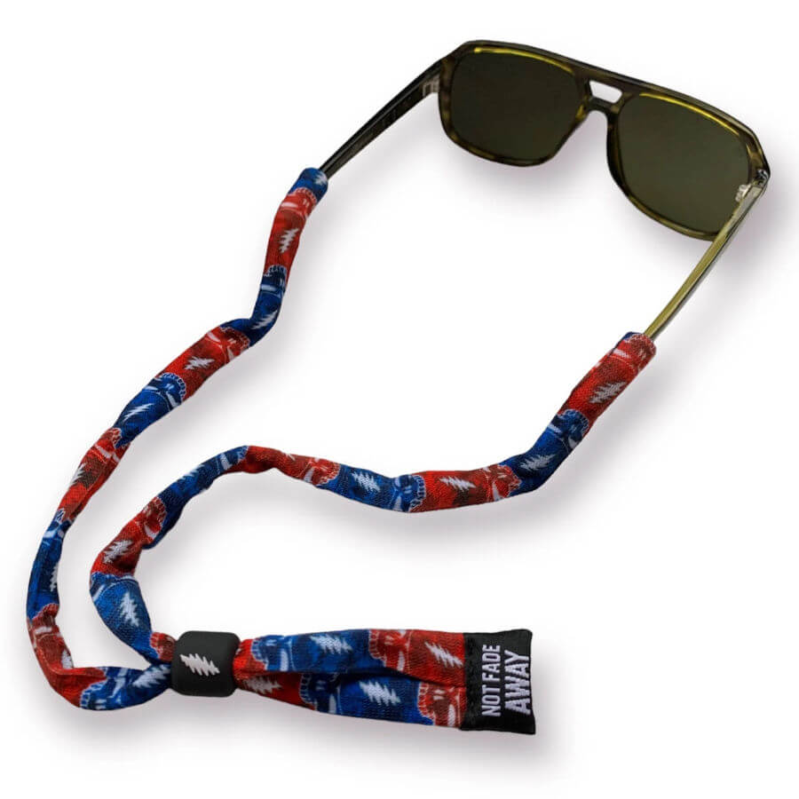 Sunglasses with a red and blue lanyard