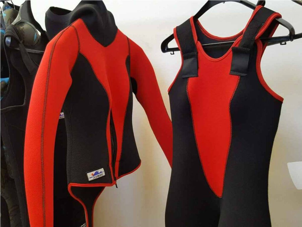 A two piece red and black wetsuit jacket with sleeveless jumpsuit