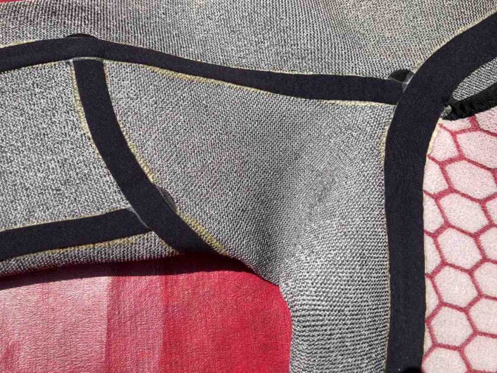 Taped seams on the inside of a wetsuit