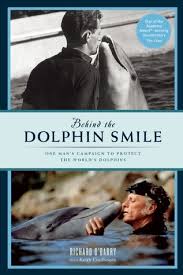 Behind a dolphins smile, scuba book cover