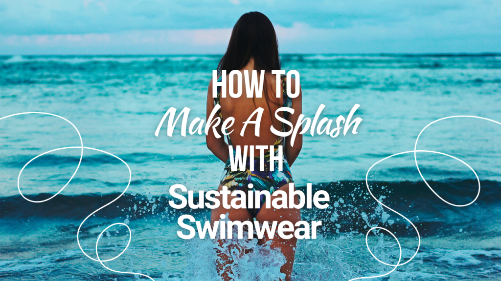 A woman in a blue swimsuit standing in the surf looking out at the ocean
