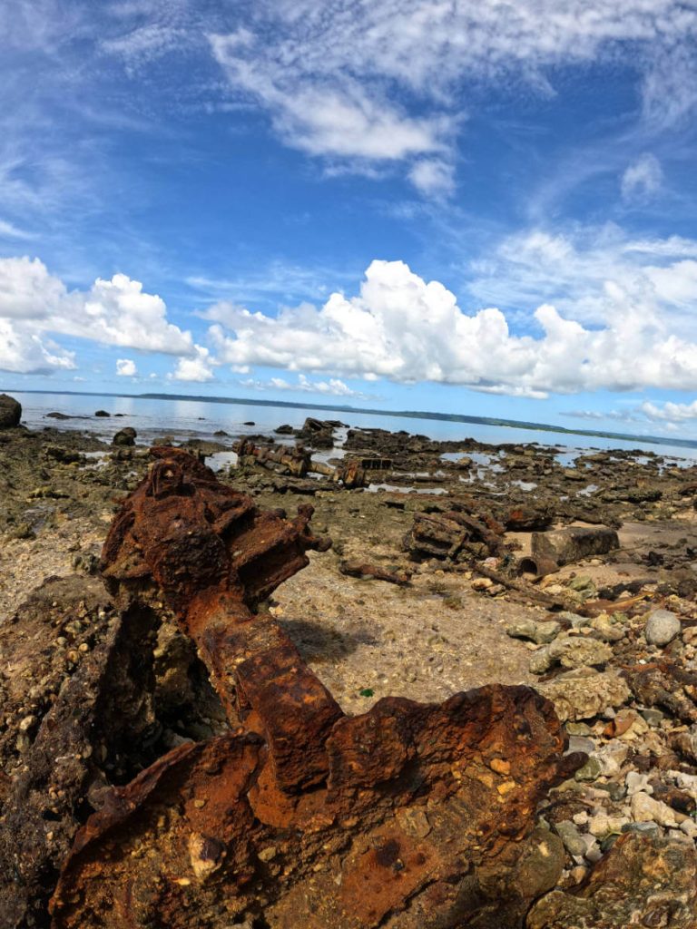 Rusting WWII trucks on the shore of Million Dollar Point, Espiritu Santo, Vanuatu