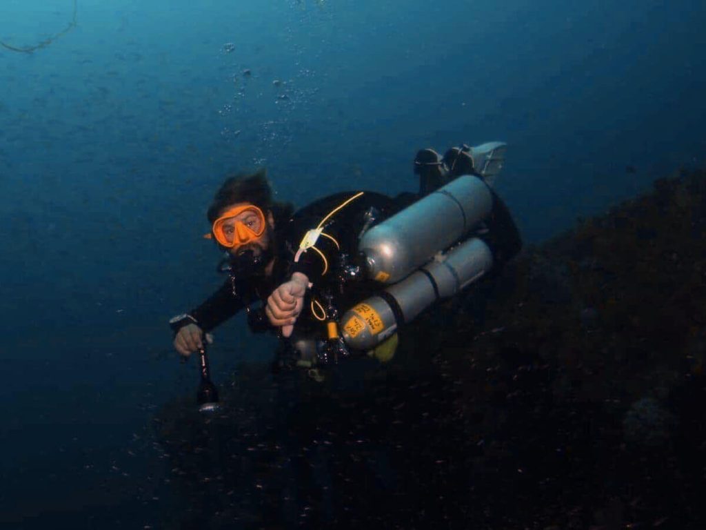 Diver in technical diving equipment